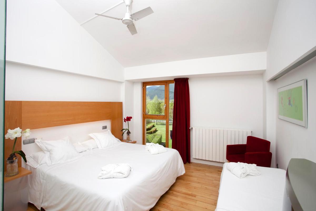 Cama o camas de una habitación en Tierra de Biescas