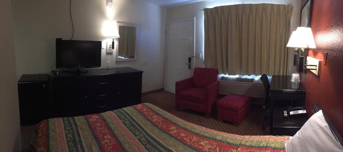 Hilltop Inn & Suites - Housity