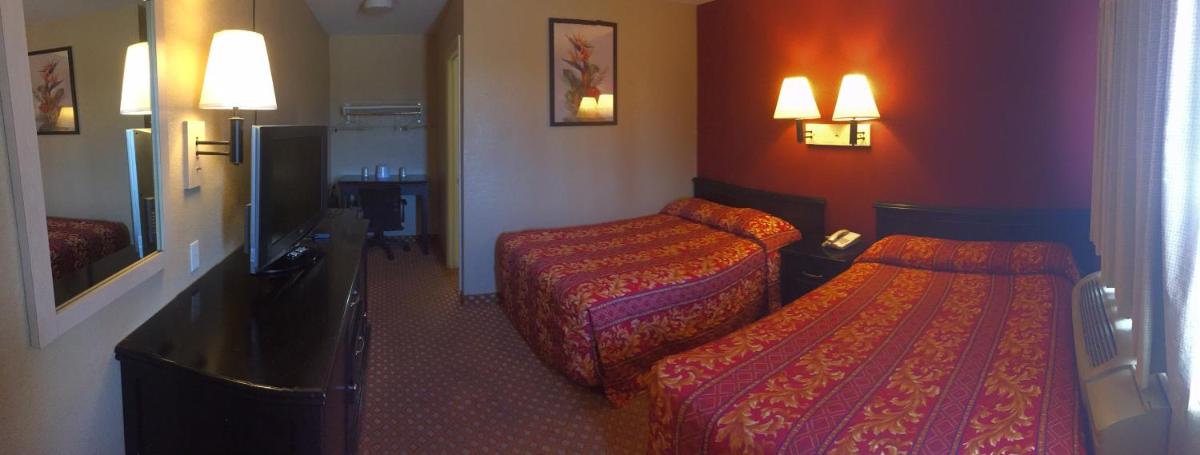 Hilltop Inn & Suites - Housity