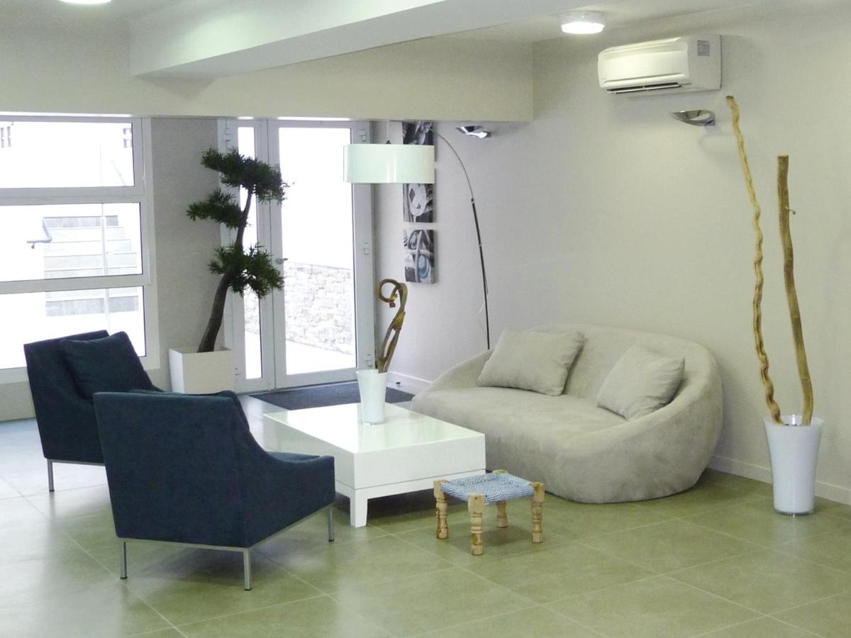 Coin salon dans l'établissement Lagrange Vacances Les Patios Eugénie