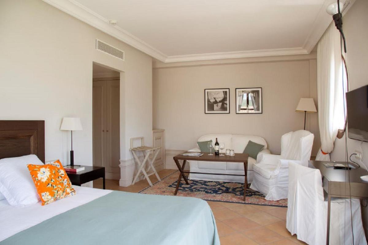 Cama o camas de una habitación en Casa Anamaria Hotel