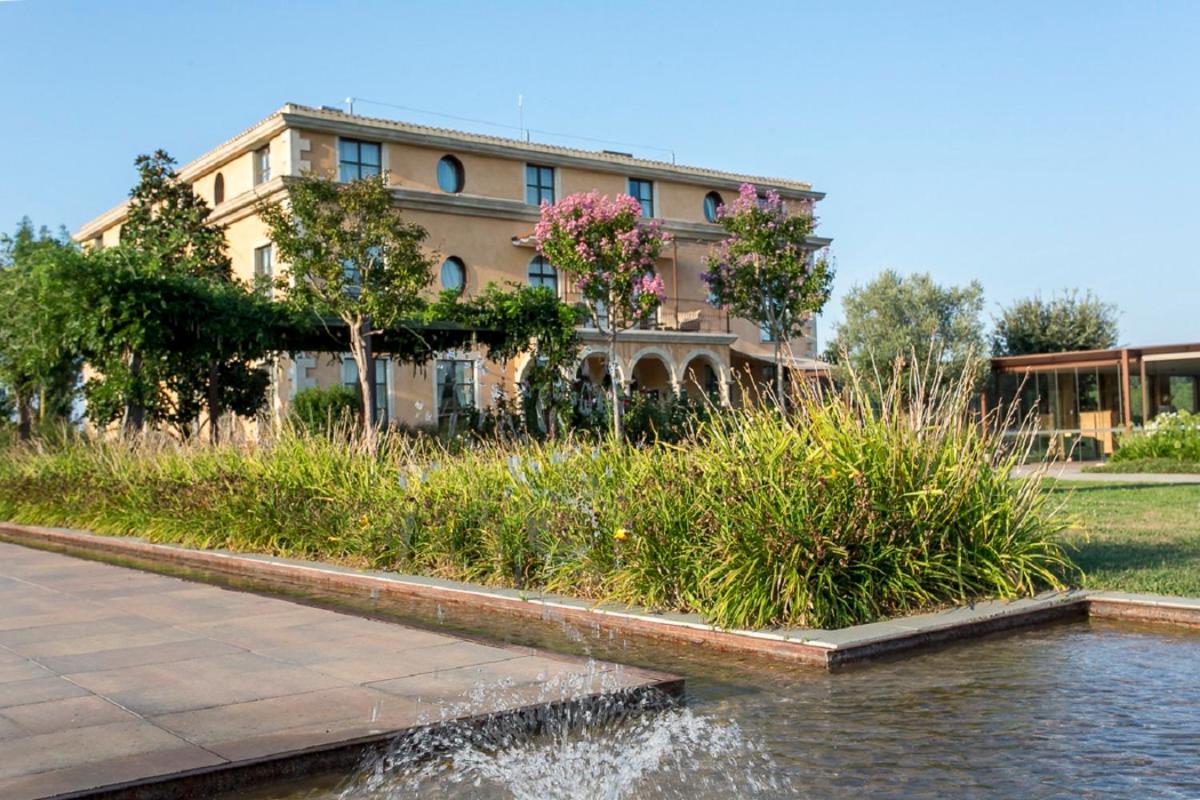 Jardín al aire libre en Casa Anamaria Hotel