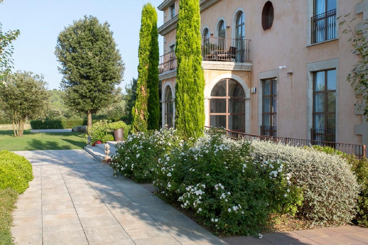 Jardín al aire libre en Casa Anamaria Hotel
