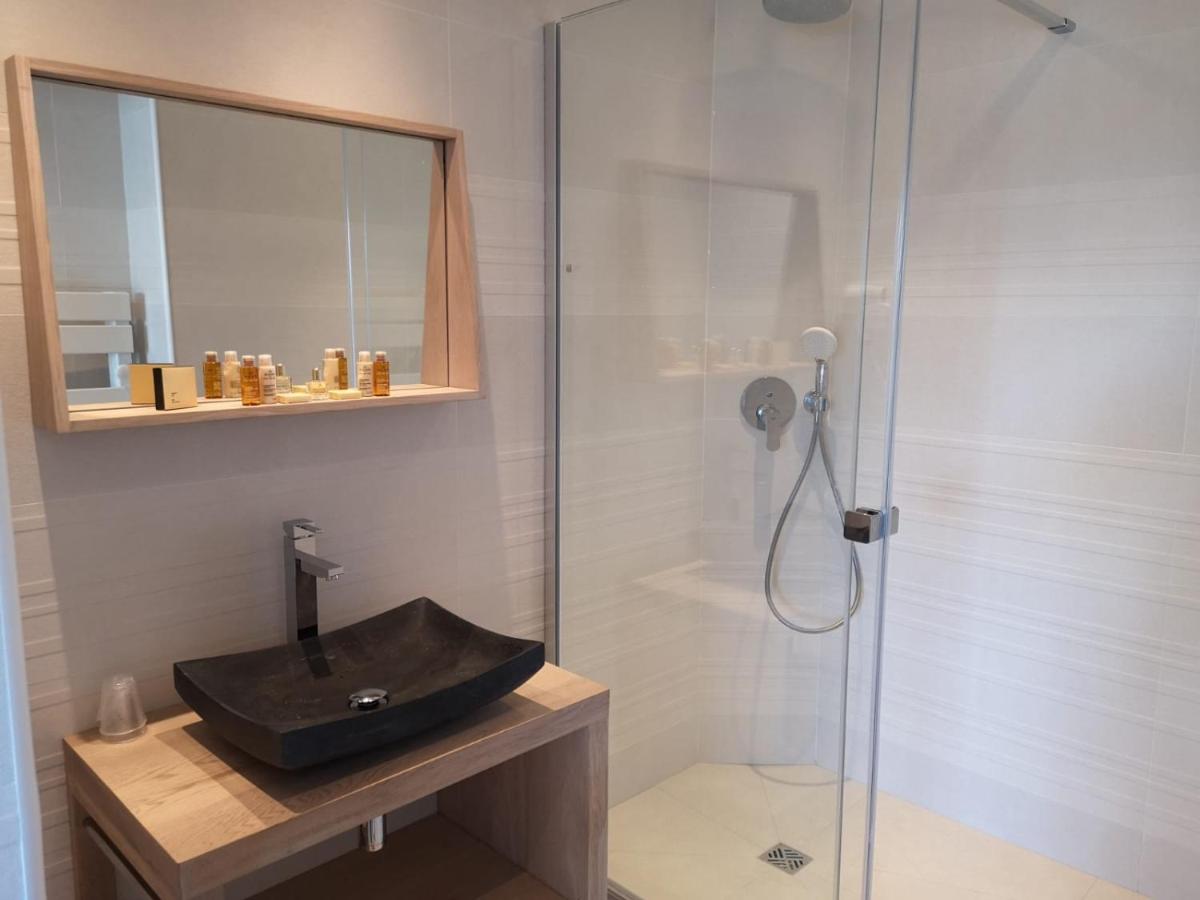 Salle de bains dans l'établissement Le Diana Hôtel & Spa