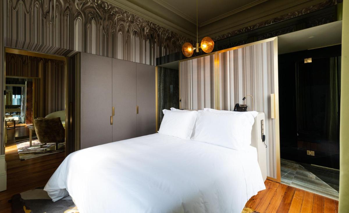 Uma cama ou camas num quarto em Vila Foz Hotel & SPA - member of Design Hotels