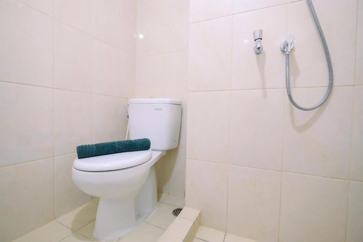 Cozy Studio Springlake Summarecon Bekasi Apartment By Travelio - Housity