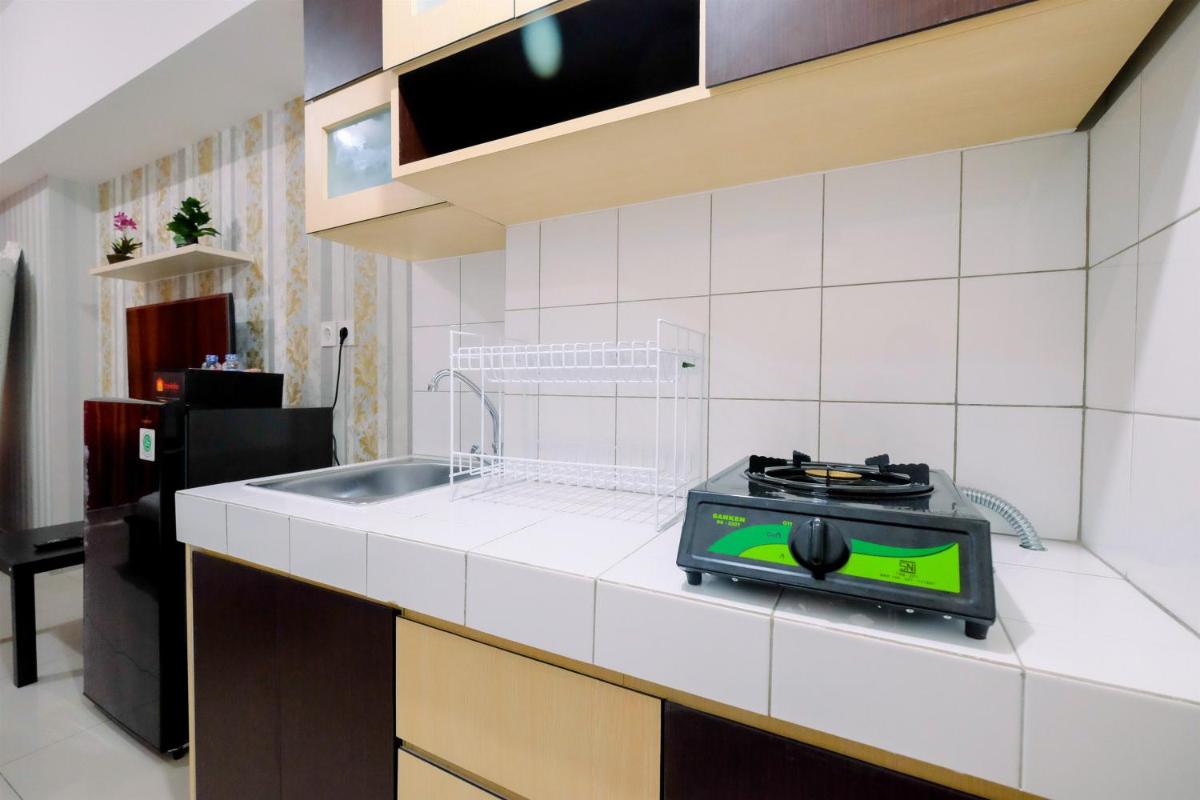 Cozy Studio Springlake Summarecon Bekasi Apartment By Travelio - Housity