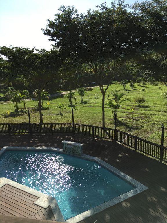 Exotic High End Unique Off-The-Grid Treehouse, steps away from the Mopan River! - Housity