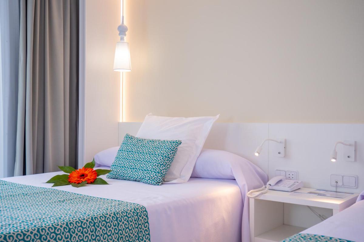 Cama o camas de una habitación en Gran Hotel Peñiscola