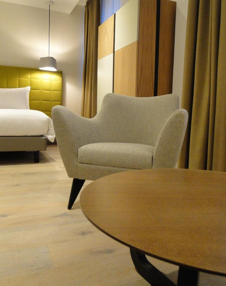 Coin salon dans l'établissement Hôtel Ginkgo - SPA Biloba
