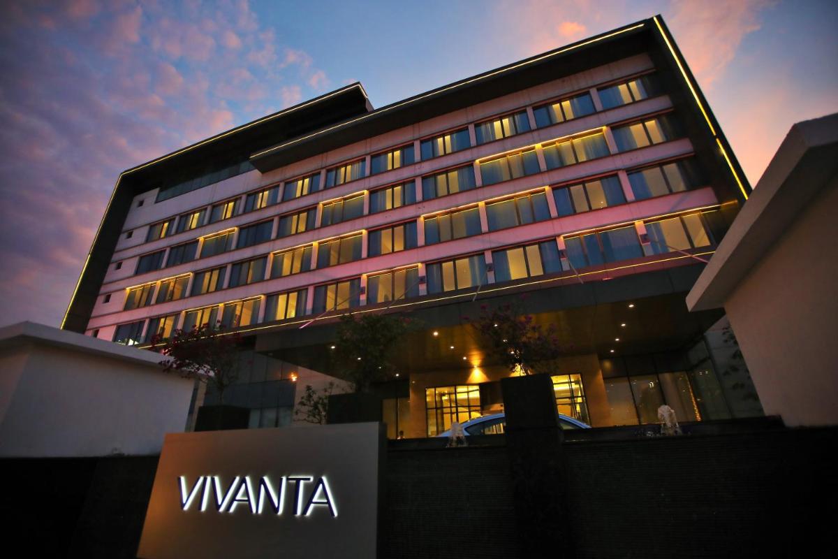 a hotel building with a sign in front of it at Vivanta Chennai IT Expressway OMR in Chennai
