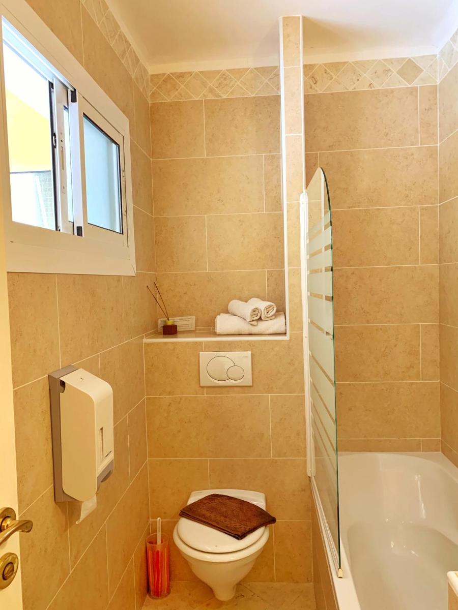 Salle de bains dans l'établissement Hôtel Beau Soleil