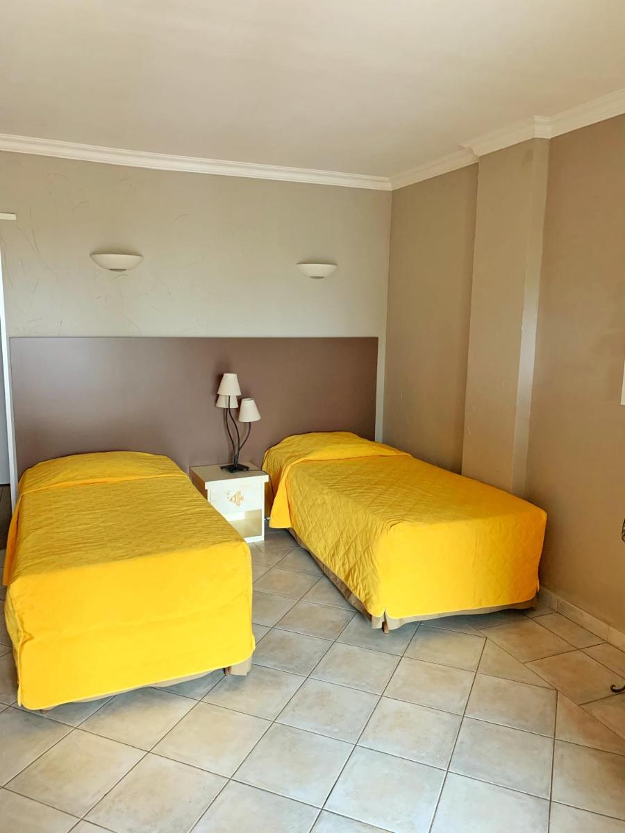 Coin salon dans l'établissement Hôtel Beau Soleil