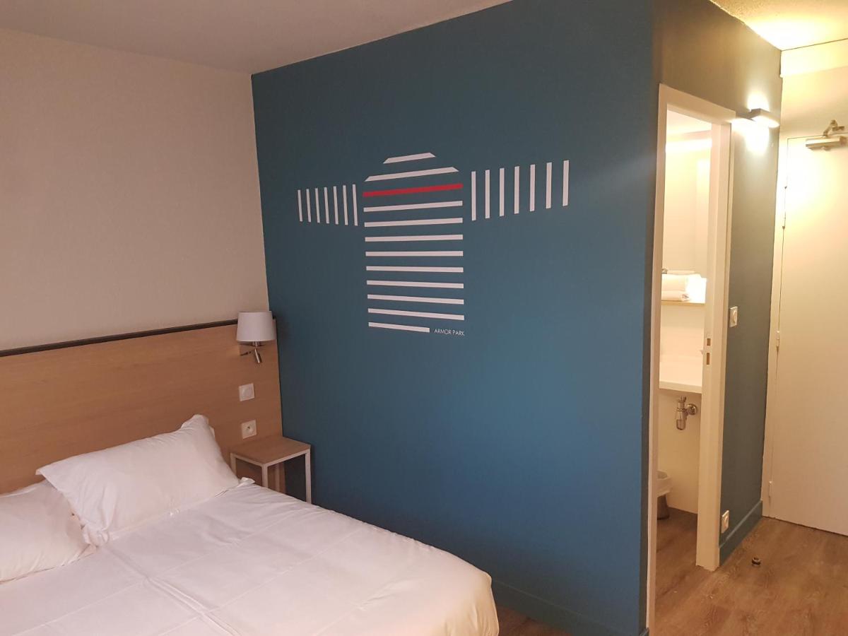 Un ou plusieurs lits dans un hébergement de l'établissement Best Western Armor Park Dinan et Spa