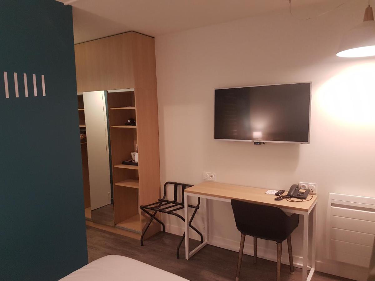 Télévision ou salle de divertissement dans l'établissement Best Western Armor Park Dinan et Spa