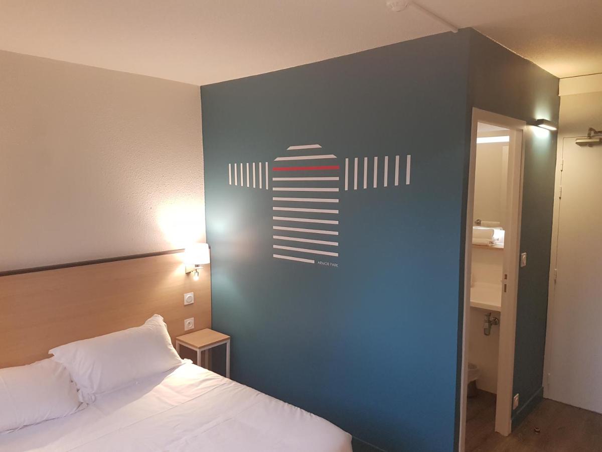 Un ou plusieurs lits dans un hébergement de l'établissement Best Western Armor Park Dinan et Spa