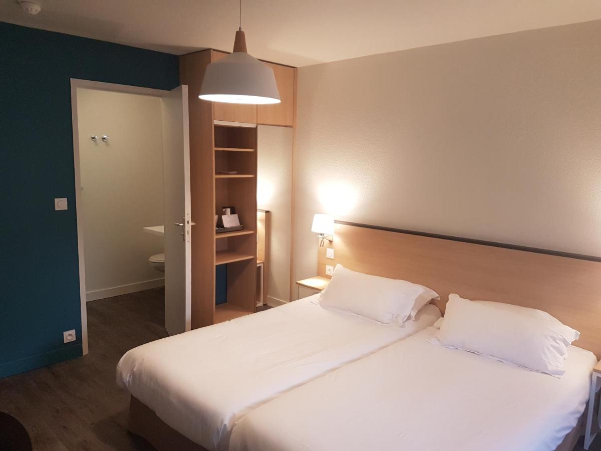 Un ou plusieurs lits dans un hébergement de l'établissement Best Western Armor Park Dinan et Spa