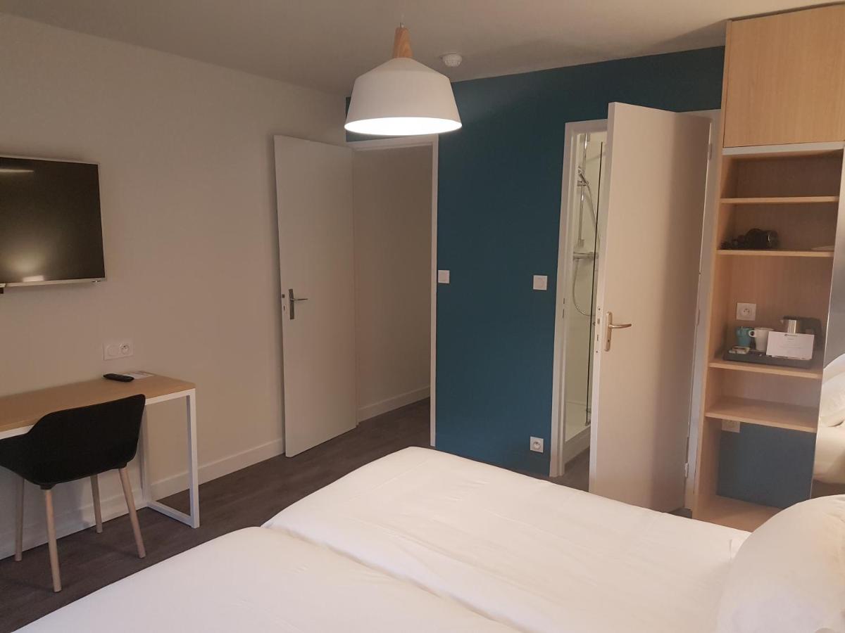 Un ou plusieurs lits dans un hébergement de l'établissement Best Western Armor Park Dinan et Spa
