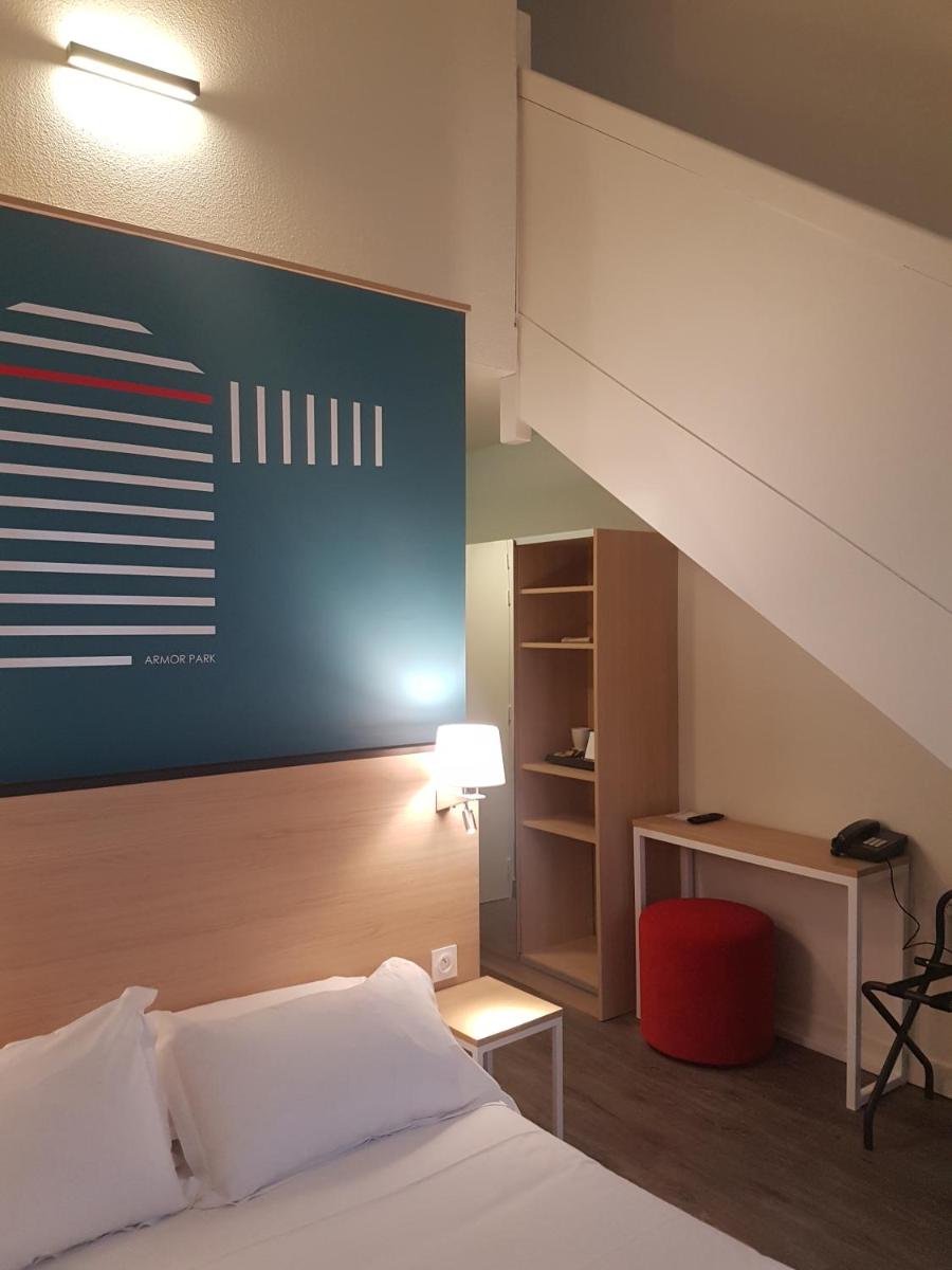 Un ou plusieurs lits dans un hébergement de l'établissement Best Western Armor Park Dinan et Spa