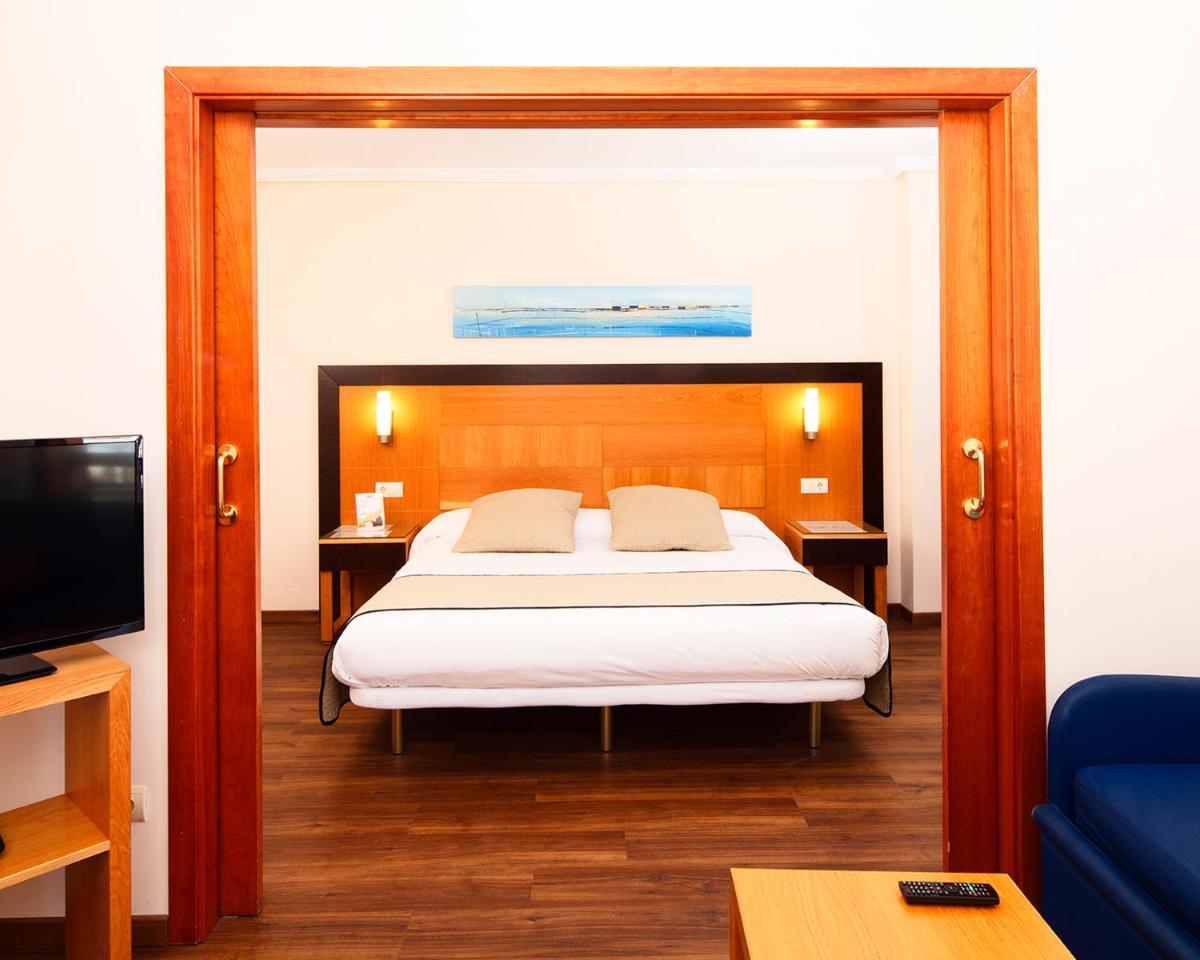 Cama o camas de una habitación en Hotel Bonalba Alicante