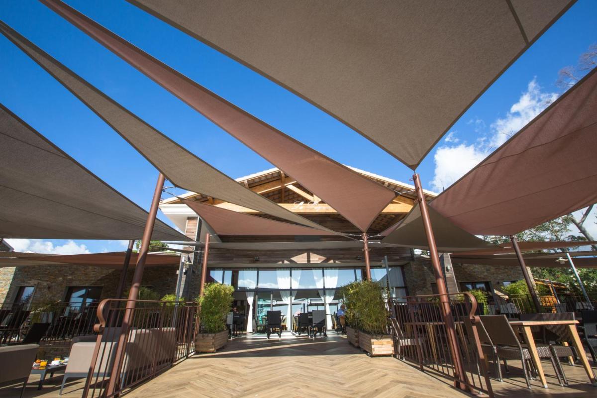 Restaurant ou autre lieu de restauration dans l'établissement Hôtel La Lagune