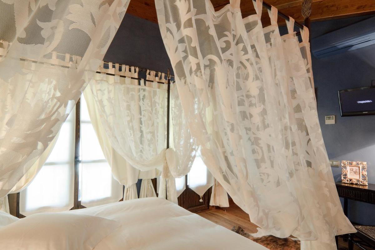 Cama o camas de una habitación en Hospederia de los Parajes