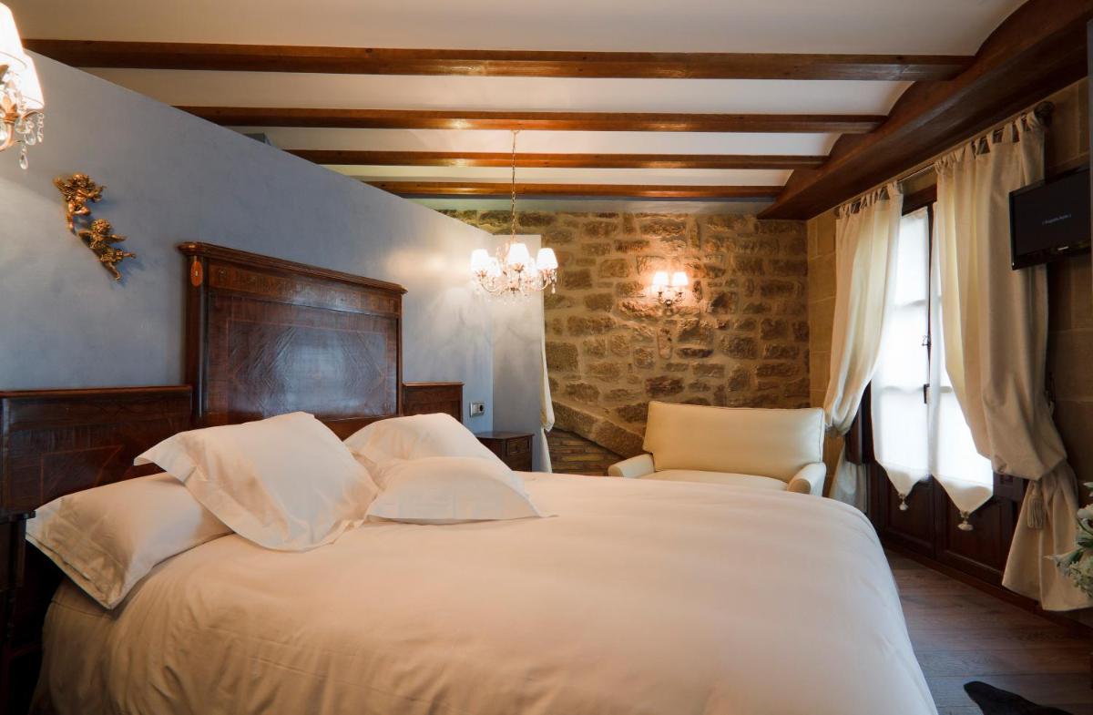 Cama o camas de una habitación en Hospederia de los Parajes