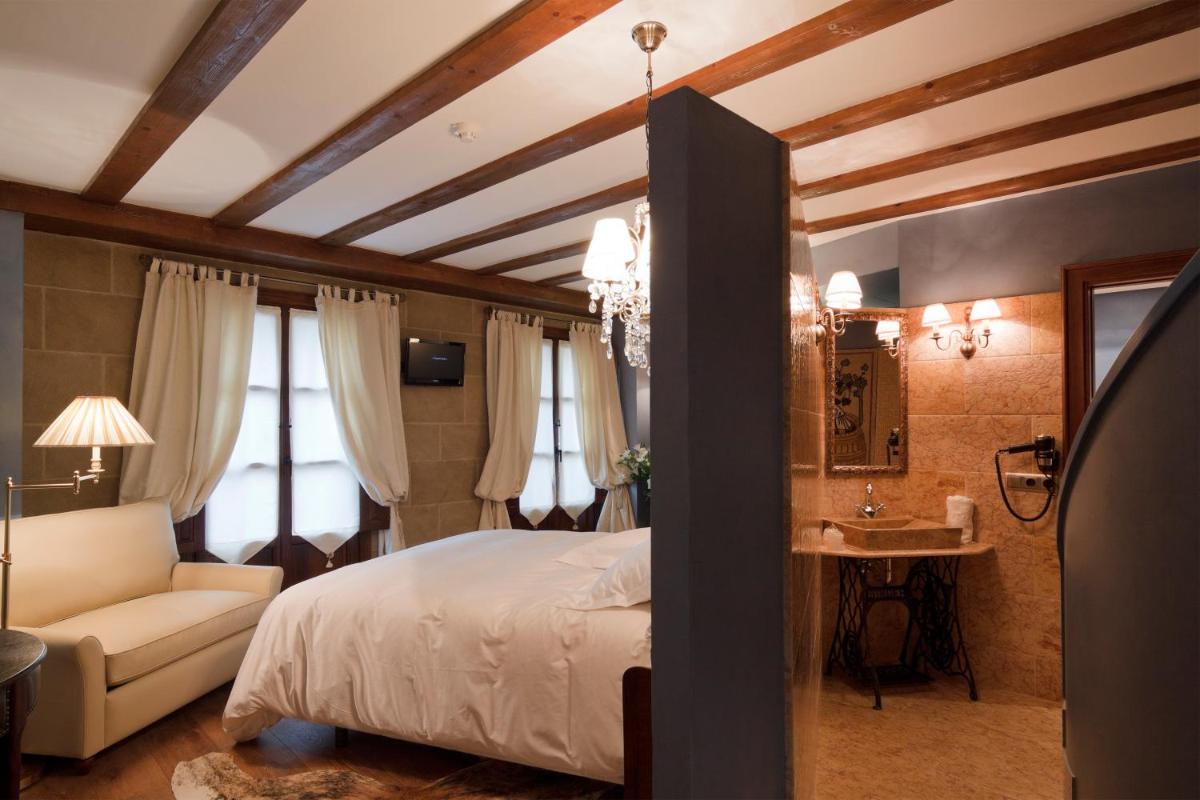 Cama o camas de una habitación en Hospederia de los Parajes