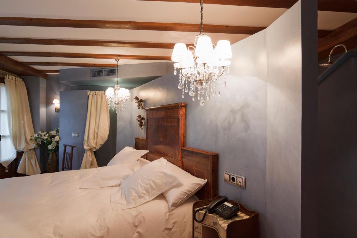 Cama o camas de una habitación en Hospederia de los Parajes