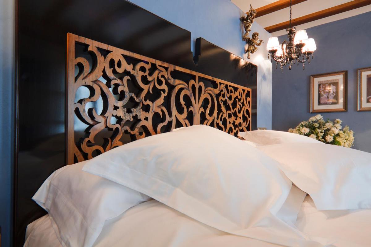 Cama o camas de una habitación en Hospederia de los Parajes