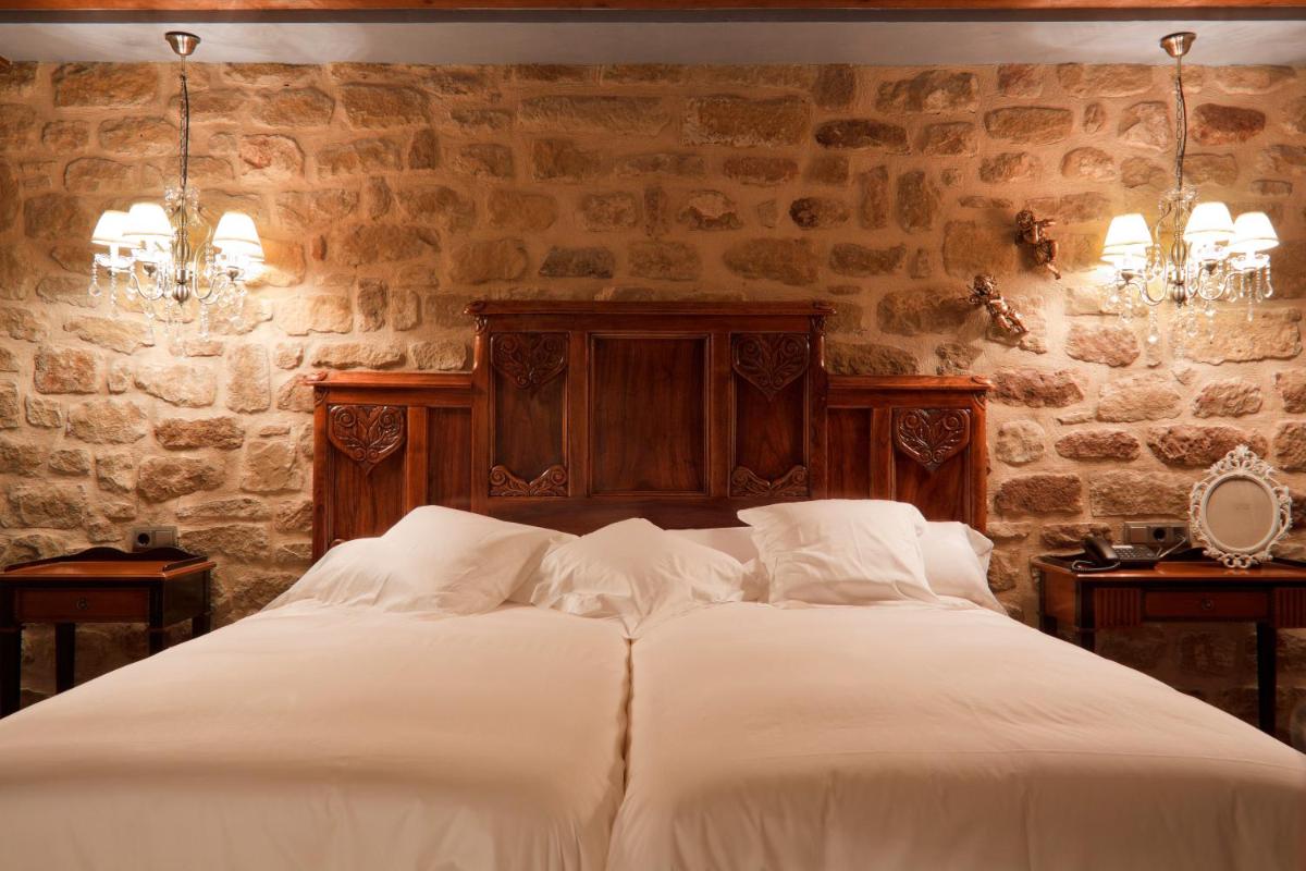 Cama o camas de una habitación en Hospederia de los Parajes
