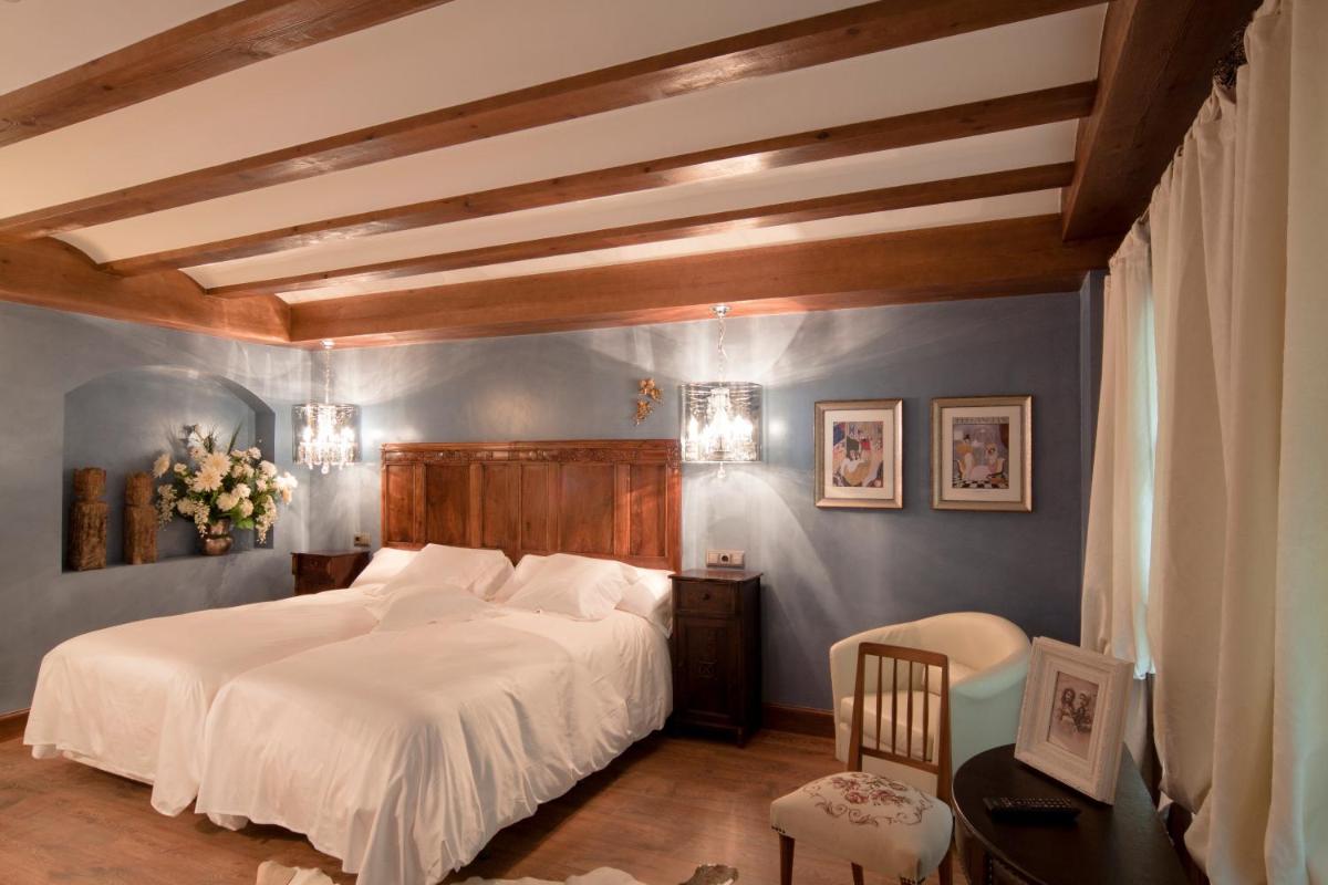 Cama o camas de una habitación en Hospederia de los Parajes