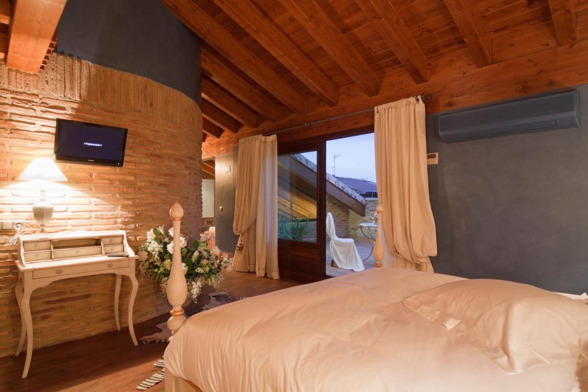 Cama o camas de una habitación en Hospederia de los Parajes