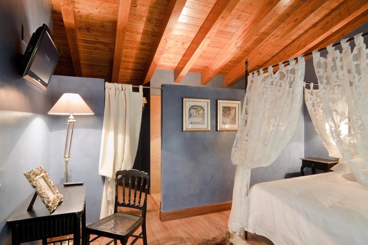 Cama o camas de una habitación en Hospederia de los Parajes