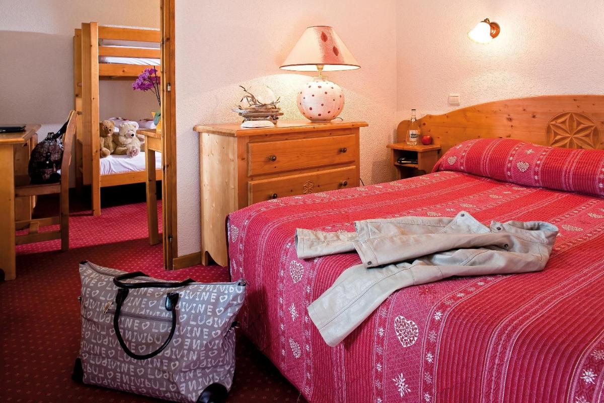Un ou plusieurs lits dans un hébergement de l'établissement Hôtel Belalp