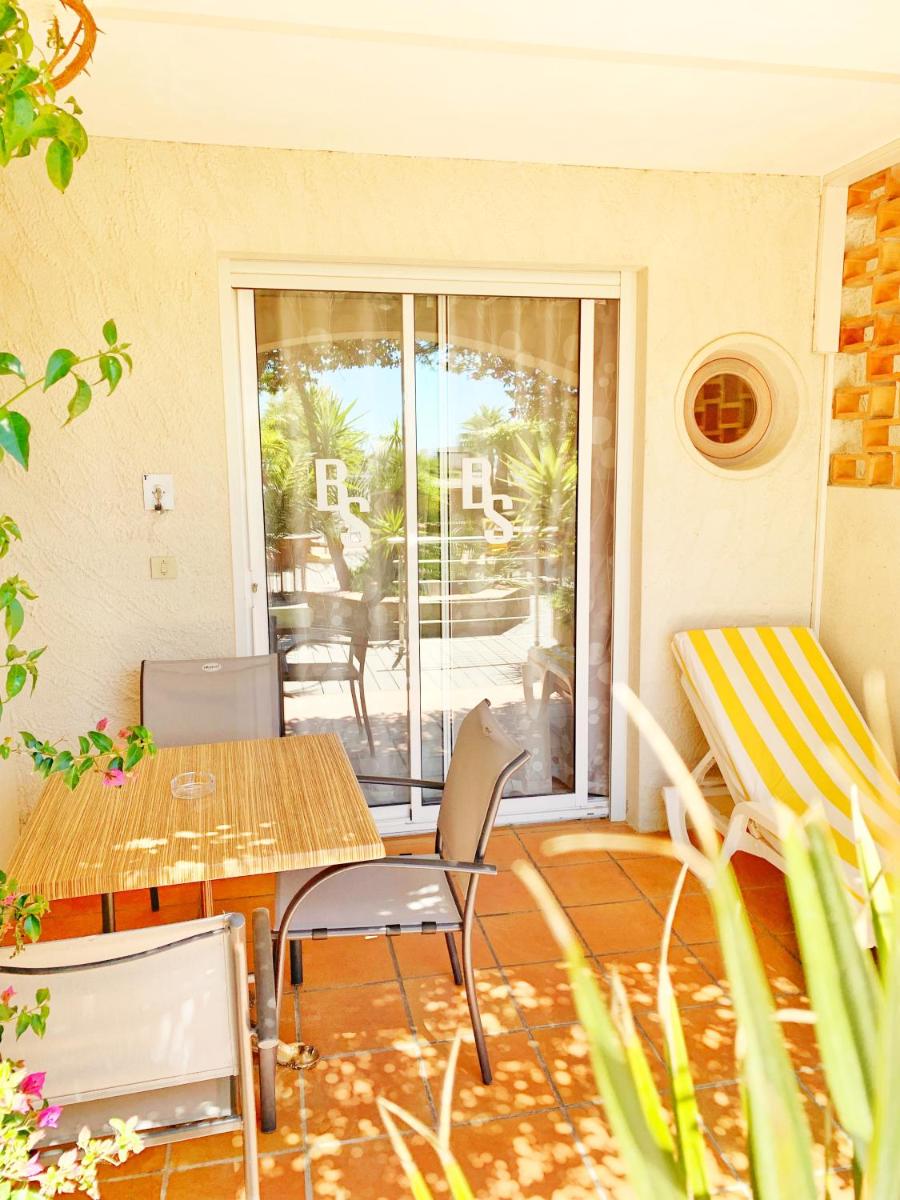Balcon ou terrasse dans l'établissement Hôtel Beau Soleil