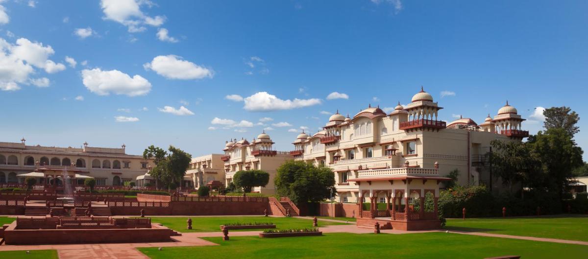 a large building with a park in front of it at Jai Mahal Palace in Jaipur