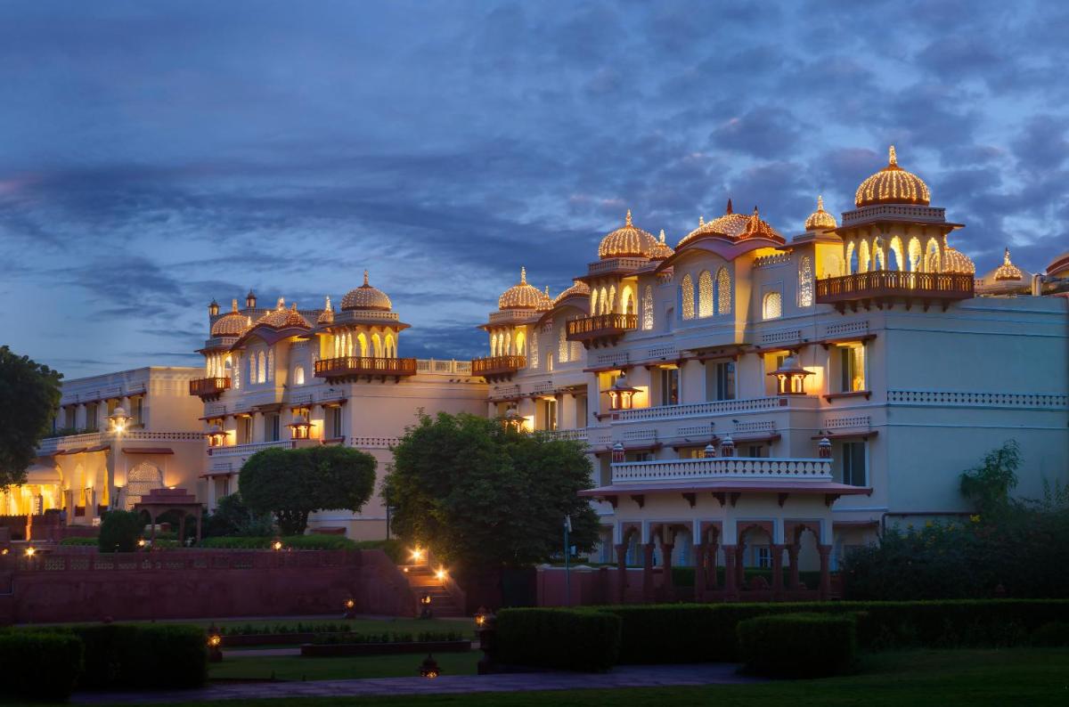 a large white building with domes on top of it at Jai Mahal Palace in Jaipur