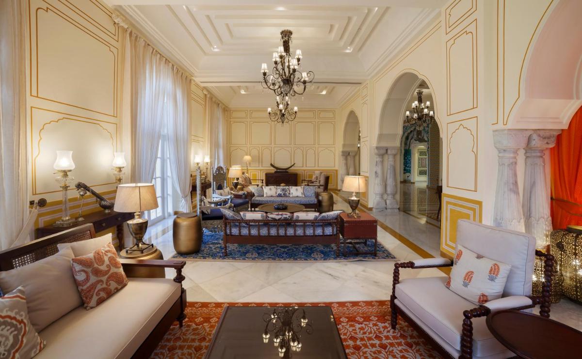 a large living room with a chandelier at Jai Mahal Palace in Jaipur
