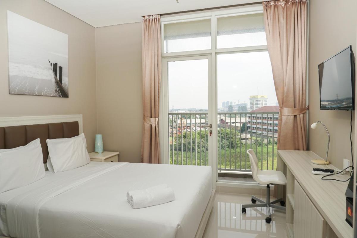 Comfy Studio Ciputra International Apartment By Travelio - Housity