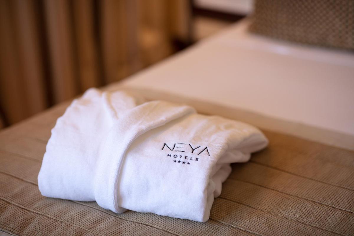 Uma cama ou camas num quarto em NEYA Lisboa Hotel