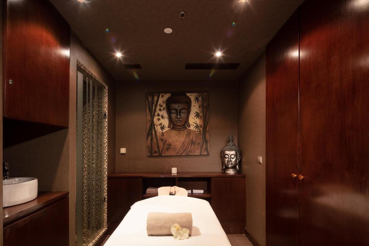 Uma cama ou camas num quarto em NEYA Lisboa Hotel