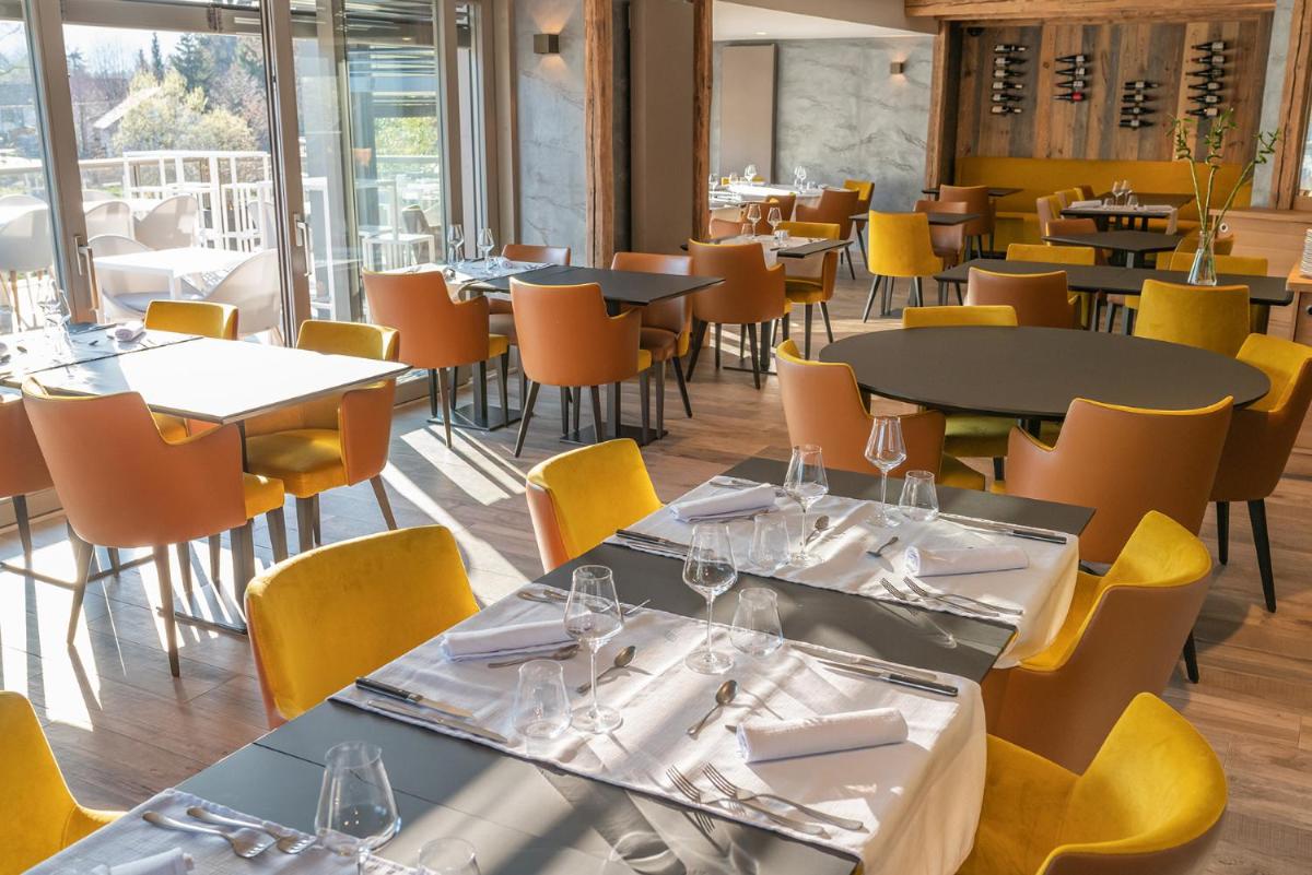 Restaurant ou autre lieu de restauration dans l'établissement Hôtel Interlaken Lounge Bar & Spa