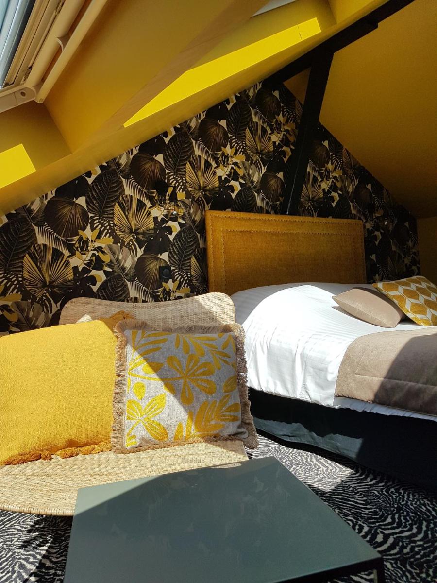 Un ou plusieurs lits dans un hébergement de l'établissement La villa 10 HÔTEL SPA
