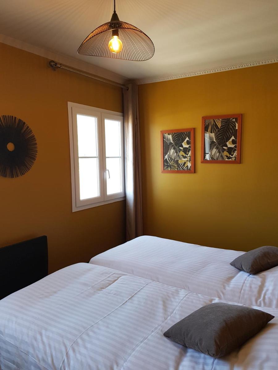 Un ou plusieurs lits dans un hébergement de l'établissement La villa 10 HÔTEL SPA