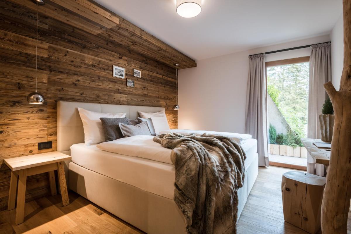 Les Dolomites Mountain Lodges - Housity
