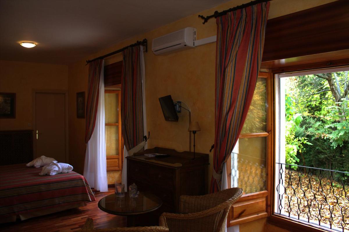 Cama o camas de una habitación en Balneario de Alhama de Granada