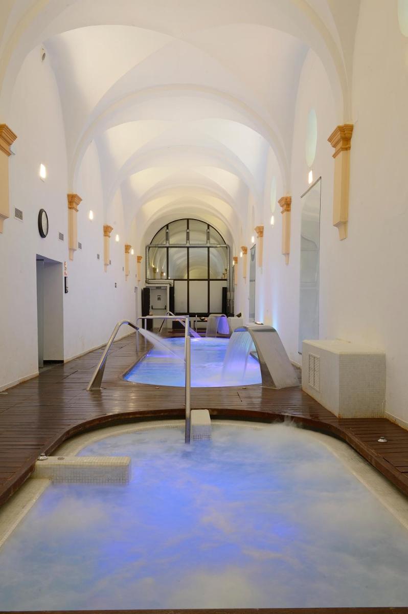 Cama o camas de una habitación en Monasterio De Piedra