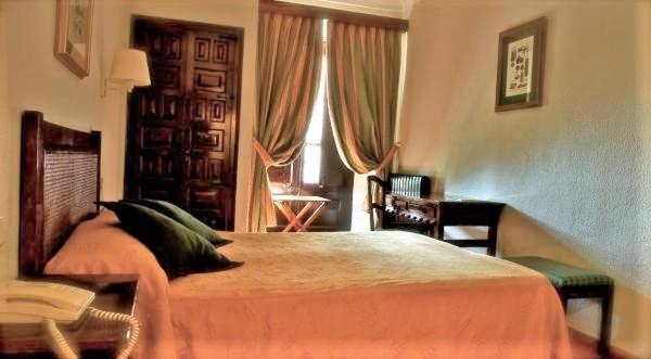 Cama o camas de una habitación en Monasterio De Piedra