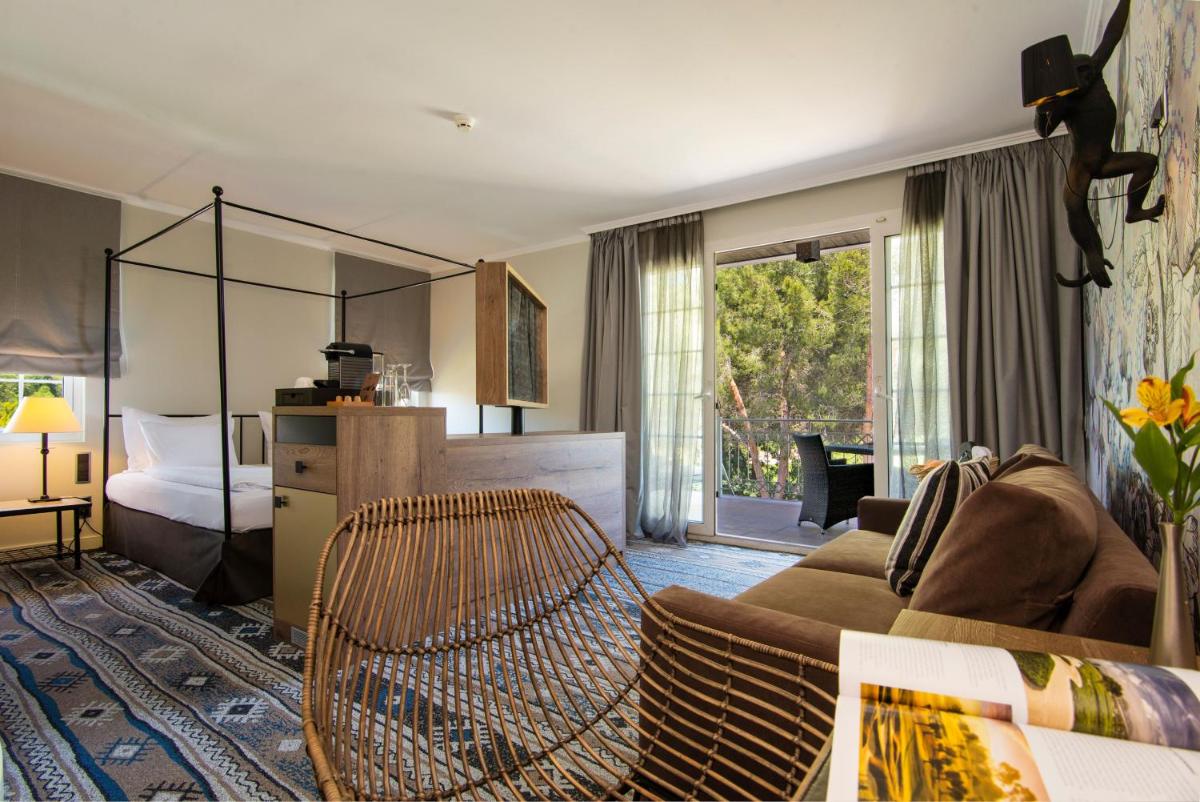Cama o camas de una habitación en Lindner Hotel Mallorca Portals Nous, part of JdV by Hyatt